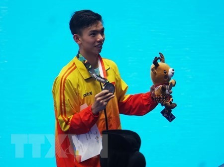Vietnam wins first ASIAD silver medal in swimming  - ảnh 1