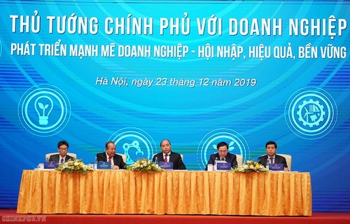PM vows to minimize risk for businesses - ảnh 1