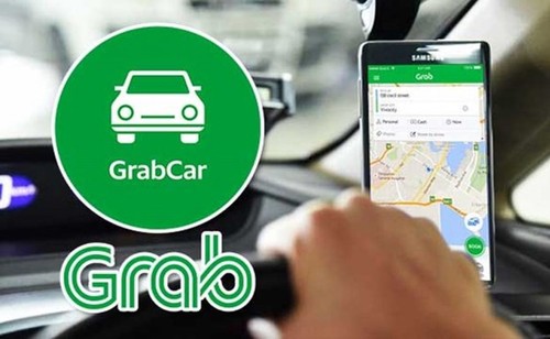 Grab resumes car service in Hanoi - ảnh 1