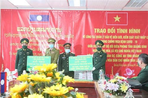 越南与老挝就边境保护、出入境和新冠肺炎防控管理工作进行讨论 - ảnh 1