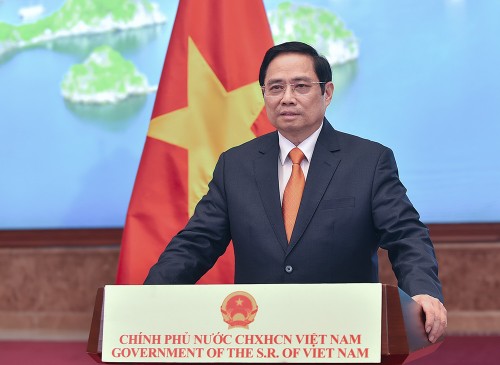 越南政府总理范明政：越南愿与中国和各国推动数字经济乃至服务贸易关系 - ảnh 1
