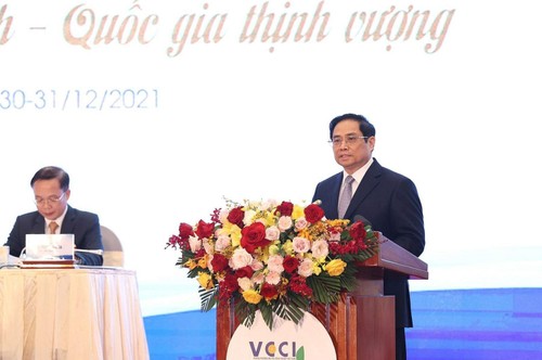 越南政府总理范明政：企业强大国家才会繁荣 - ảnh 1