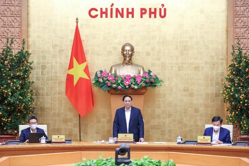 越南政府总理范明政要求立即落实2022年各项任务 - ảnh 1