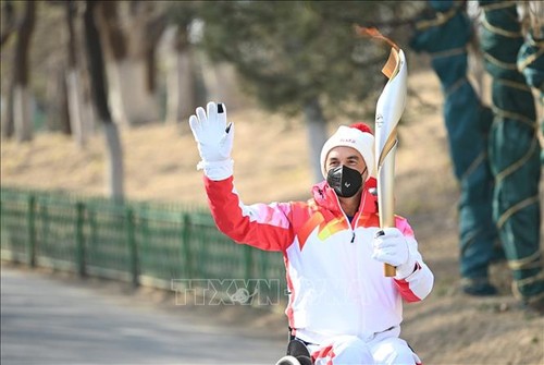 2022年北京冬季残奥会火炬传递仪式在北京奥林匹克森林公园举行 - ảnh 1