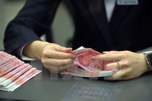 Chinas Währung Yuan wird Weltreservewährung - ảnh 1