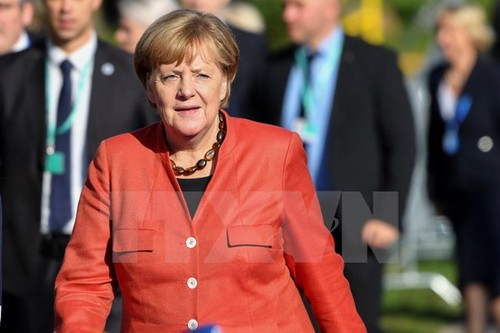 Bundeskanzlerin Angela Merkel erreicht Vereinbarung mit CSU über Migrationspolitik - ảnh 1
