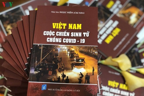 Buchpremiere “Vietnam - erbitterter Kampf gegen Covid-19” - ảnh 1