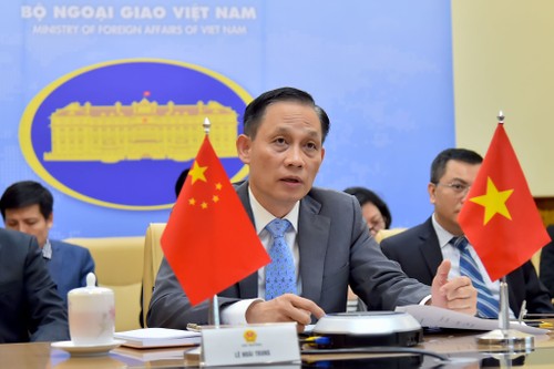 Online Konferenz der Generalsekretär des Verwaltungsstabes für Zusammenabeit zwischen Vietnam und China - ảnh 1