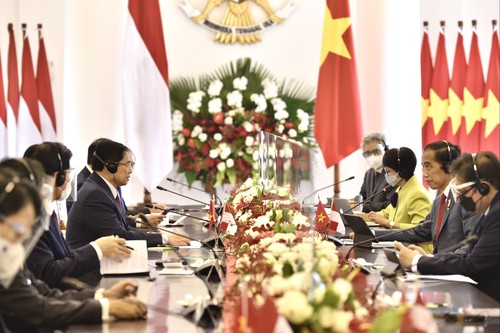 Premierminister Pham Minh Chinh trifft Indonesiens Präsident Joko Widodo - ảnh 1