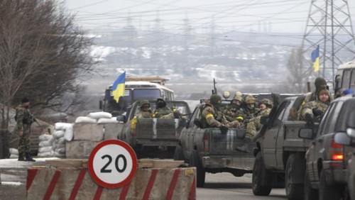 Fighting escalates in Eastern Ukraine prior to Paris 4-party talks  - ảnh 1