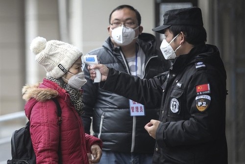 OMS decide no declarar emergencia internacional por el coronavirus de Wuhan - ảnh 1