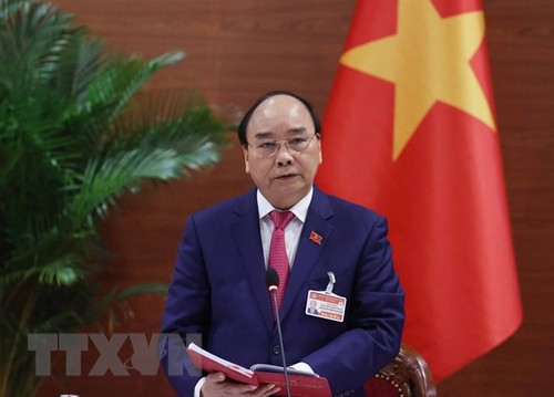 Líder laosiano felicita al primer ministro vietnamita - ảnh 1