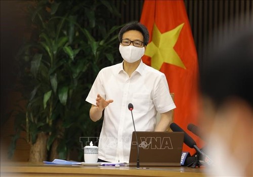 Vicepremier vietnamita exigen evitar propagación del covid-19 en zonas industriales - ảnh 1