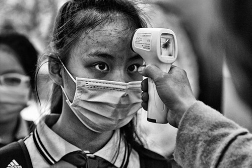 Reportero vietnamita gana título honorífico en concurso de Fotoperiodismo de España - ảnh 1