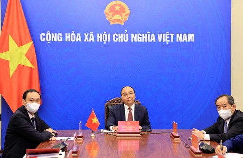 El presidente de Vietnam agradece la asistencia de empresas surcoreanas en la lucha contra la pandemia en el país. - ảnh 1