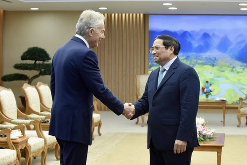 Premier vietnamita recibe al ex primer ministro británico - ảnh 1