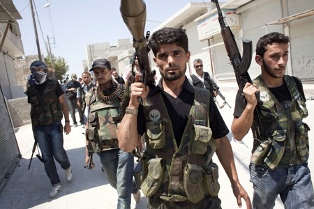 Diferendos entre potencias sobre suministro de armas a la oposición en Siria - ảnh 1