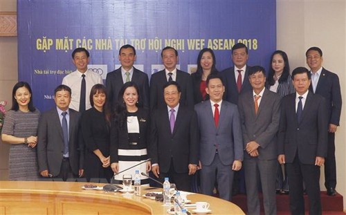 Deputy PM meets WEF ASEAN 2018 sponsors - ảnh 1