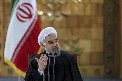 Iranian president calls US sanctions an economic war on Iran  - ảnh 1