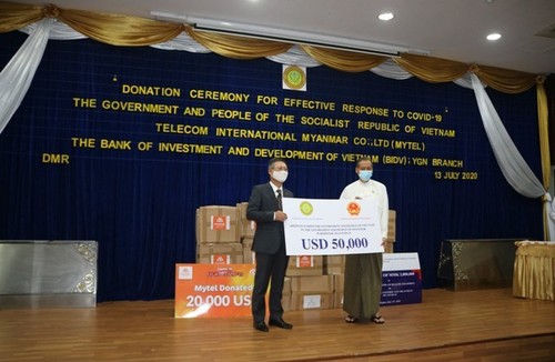 베트남 정부, 미얀마를 위한 코로나19 팬데믹 방역 지원품 전달식 - ảnh 1