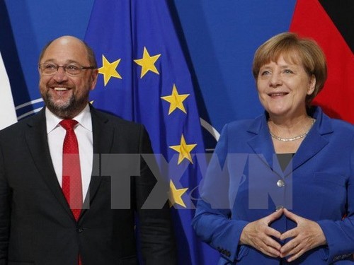  Allemagne: Merkel et les sociaux-démocrates se rapprochent peu à peu - ảnh 1