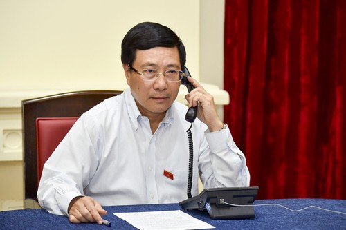 Conversation téléphonique entre le vice-PM Pham Binh Minh et le chef de la diplomatie singapourienne - ảnh 1