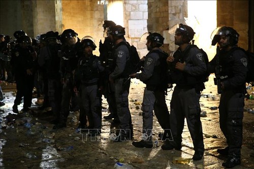 Neuf palestiniens ont été blessés suite à des confrontations avec la police israélienne   - ảnh 1