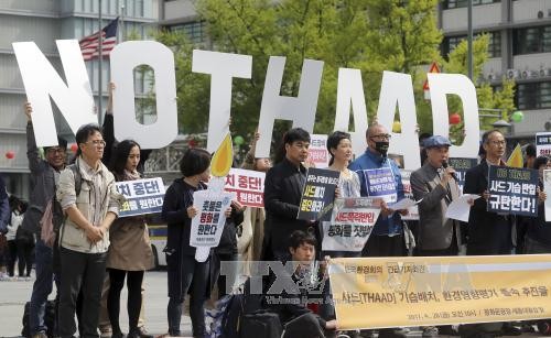 Тысячи корейцев окружили посольство США в Сеуле для протеста размещения систем ПРО  - ảnh 1