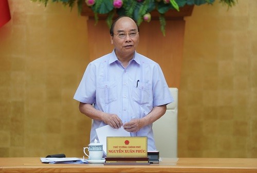 Премьер-министр Нгуен Суан Фук председательствовал на заседании Посткома правительства по ситуации с Covid-19 - ảnh 1