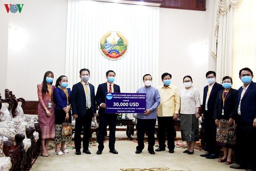 Doanh nghiệp Việt Nam ủng hộ Lào 30.000 USD chống dịch - ảnh 1