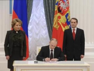 Presiden Rusia V.Putin memberlakukan Undang-Undang tentang penggabungan Krimea - ảnh 1