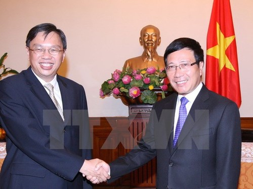 Vietnam dan Singapura memperkuat persatuan, mengembangkan peranan sentral dari ASEAN - ảnh 1