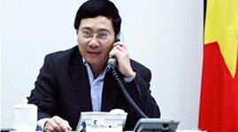 Вице-премьер, глава МИД СРВ провёл телефонный разговор с главой МИД Малайзии - ảnh 1