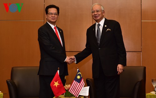 Нгуен Тан Зунг встретился с премьером Малайзии и президентом Филиппин - ảnh 1