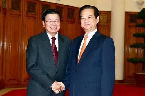 Премьер Вьетнама Нгуен Тан Зунг принял вице-премьера, главу МИД Лаоса - ảnh 1