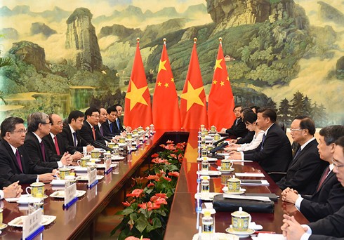 Премьер Вьетнама встретился с генсекретарем ЦК КПК, председателем КНР - ảnh 2