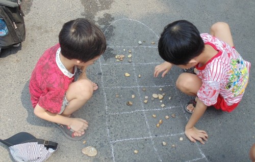 Традиционная игра «О Ан Куан» в пешеходном пространстве Ханоя - ảnh 5
