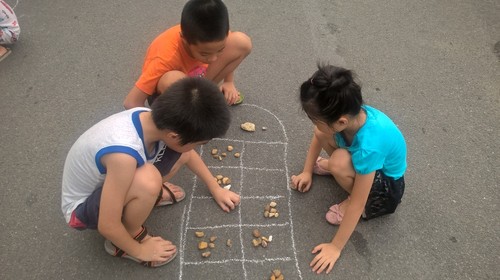 Традиционная игра «О Ан Куан» в пешеходном пространстве Ханоя - ảnh 7