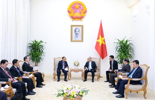 Премьер Вьетнама Нгуен Суан Фук принял вице-спикера парламента Лаоса - ảnh 1