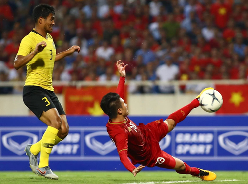 СМИ Азии о победе сборной Вьетнама над командой Малайзии в отборочном матче ЧМ-2022 - ảnh 1
