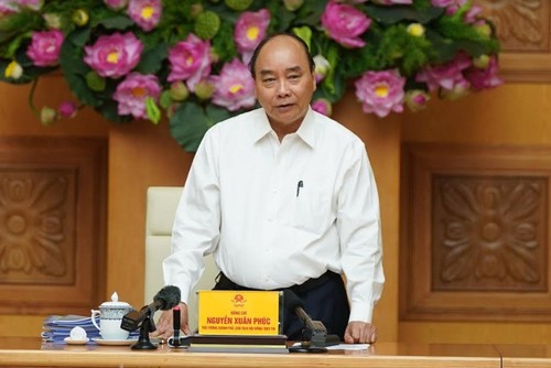 Премьер Нгуен Суан Фук: патриотизм помогает Вьетнаму преодолеть трудности - ảnh 1