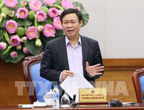 Le vice-Premier ministre Vuong Dinh Hue travaille avec l’Audit d’Etat - ảnh 1