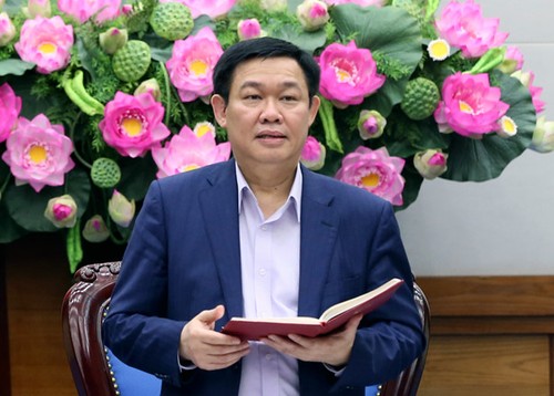 Vuong Dinh Hue: nos politiques monétaires et financières vont dans le bon sens - ảnh 1