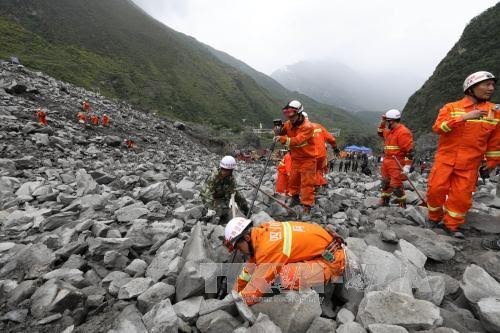 Glissement de terrain en Chine : 15 corps déjà retrouvés - ảnh 1