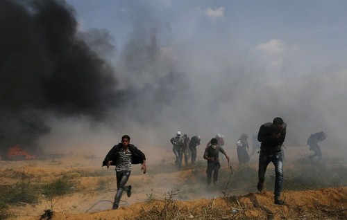 Trois Palestiniens tués, 600 blessés dans la bande de Gaza - ảnh 1
