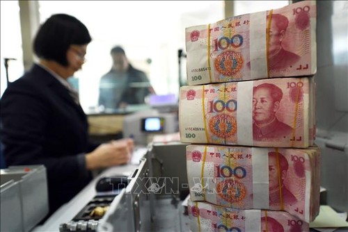 Le yuan chinois tombe à son niveau le plus bas depuis 10 ans - ảnh 1