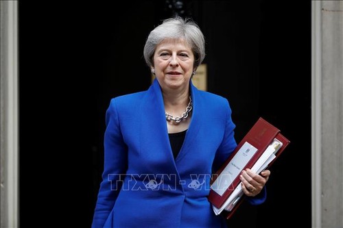 Brexit: peu d'avancées à Bruxelles, Theresa May devra revenir samedi - ảnh 1