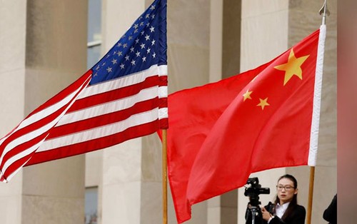 Américains et Chinois parleraient déjà de l’application du traité - ảnh 1