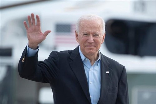 Joe Biden est arrivé au Japon pour sa première tournée en Asie - ảnh 1