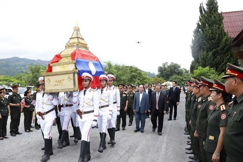 Hồi hương hài cốt liệt sĩ Việt Nam hy sinh tại Lào - ảnh 1